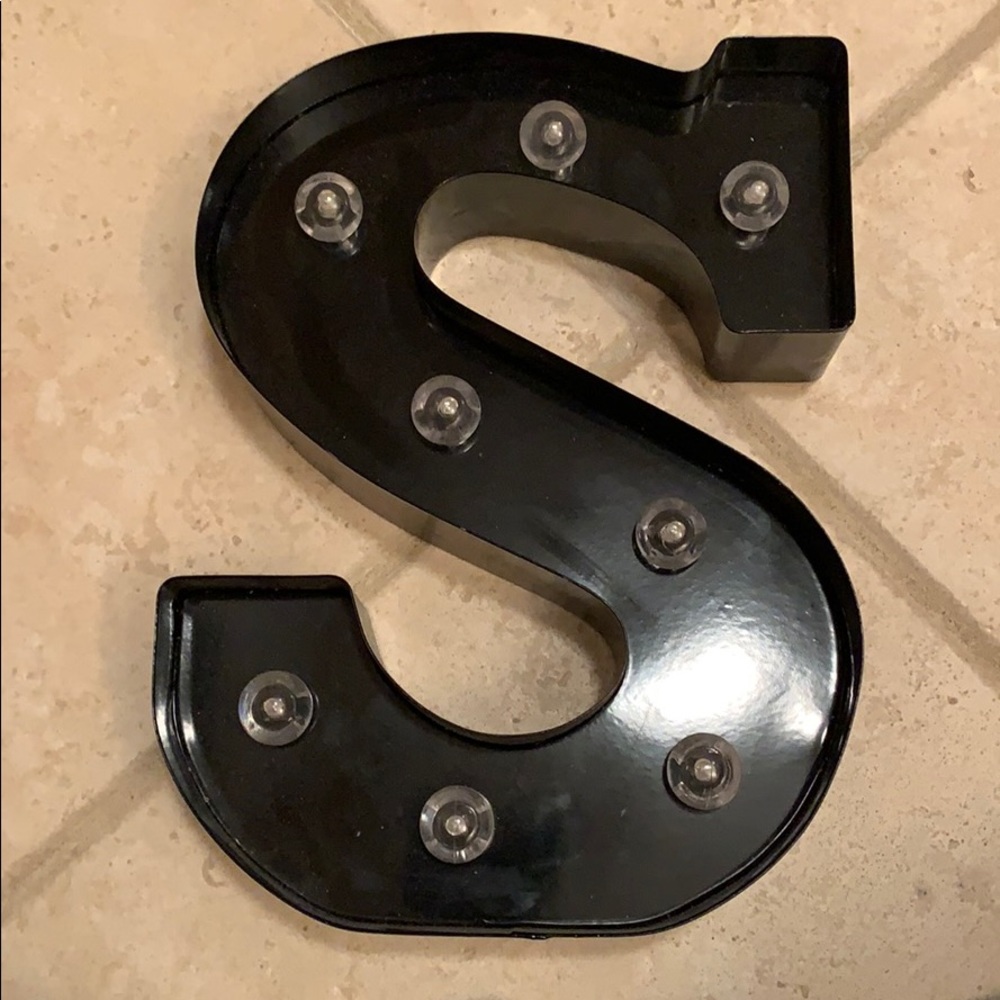 Battery operated black S